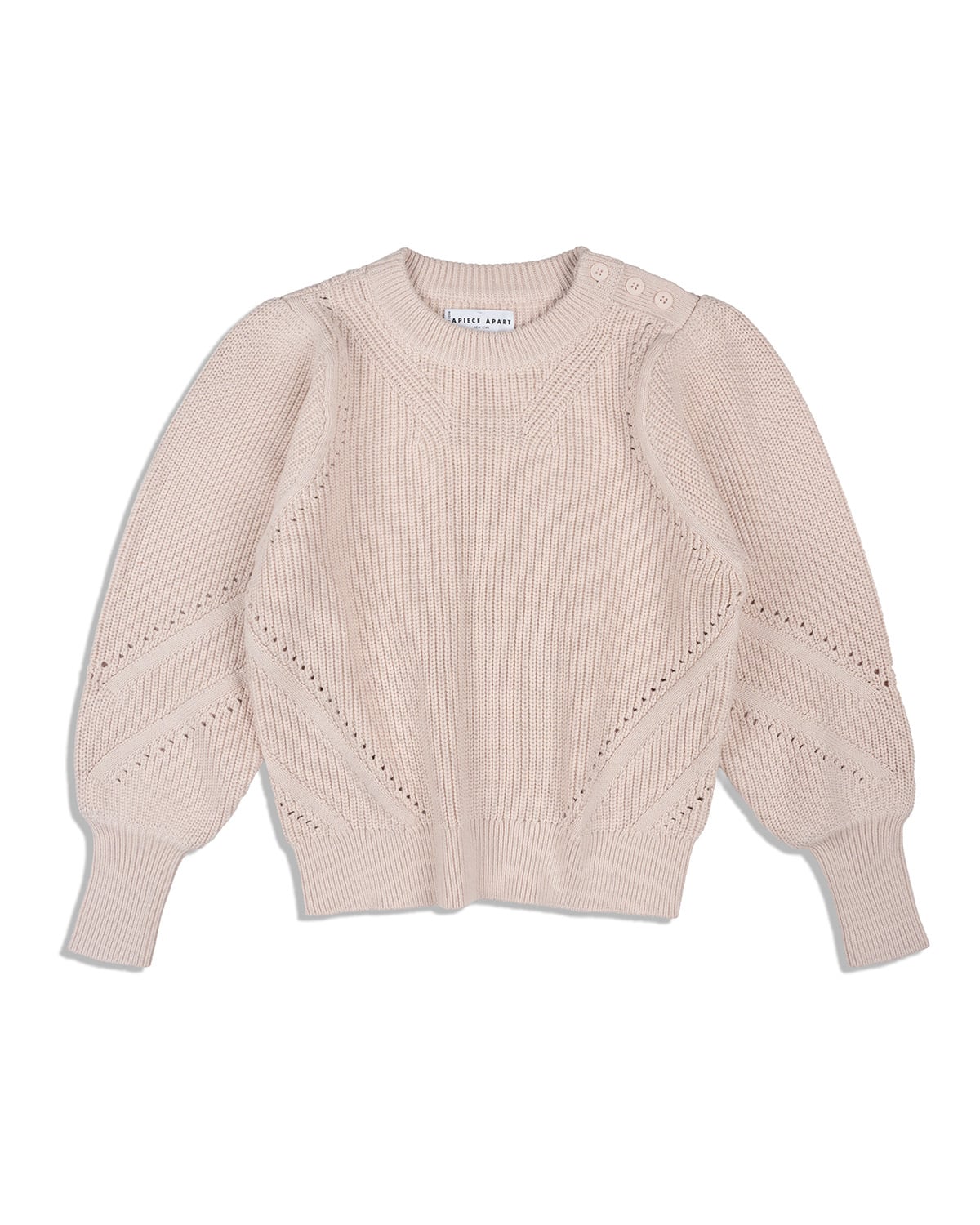 Cream ribbed sweater with chevron detail. White-on-white knit stitch definition