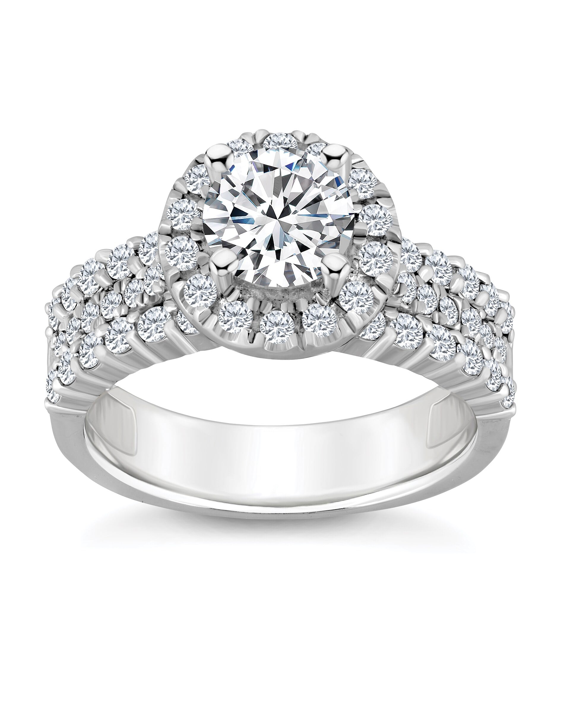 Diamond halo engagement ring set. Dual-ring composition with matched lighting